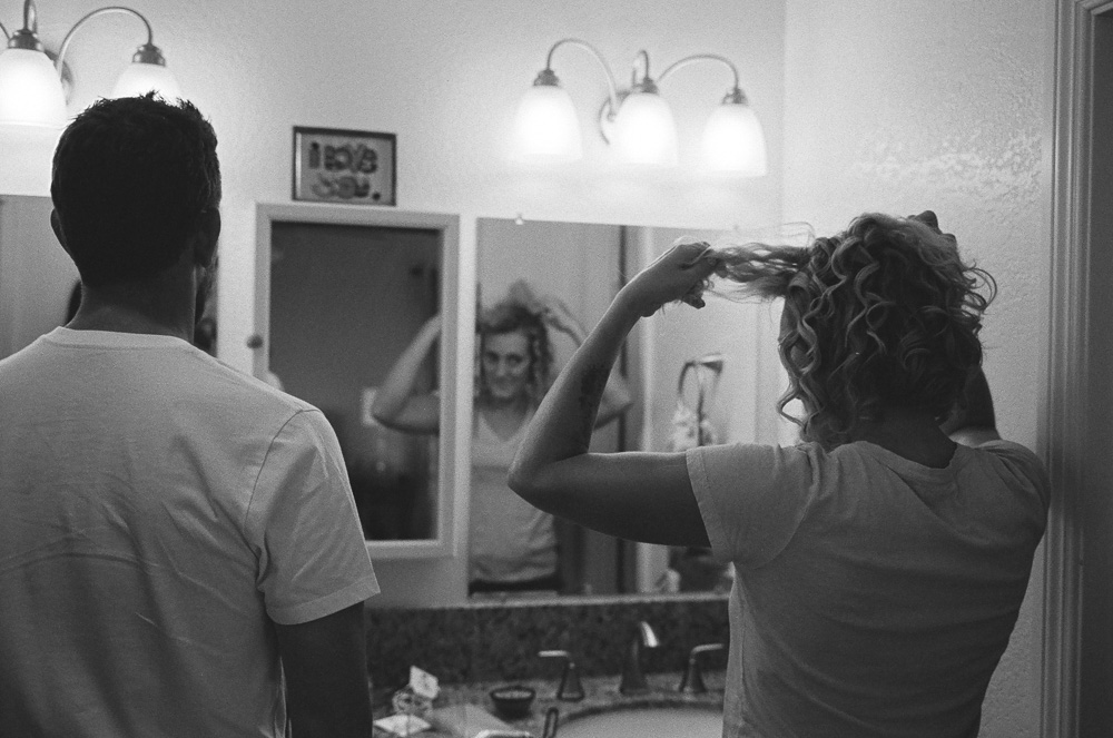 Couple (Jeff and Morgan) at the bathroom sink. ©William Bay Photographic Arts.