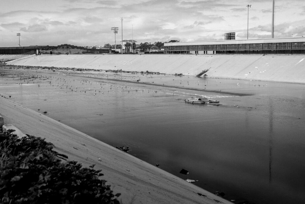 The Tijuana River after a small rain. Looking towards the US border fence.