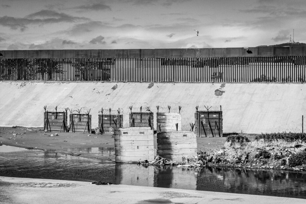 Corrugated metal barriers in the Tijuana River Channel along the United States border.