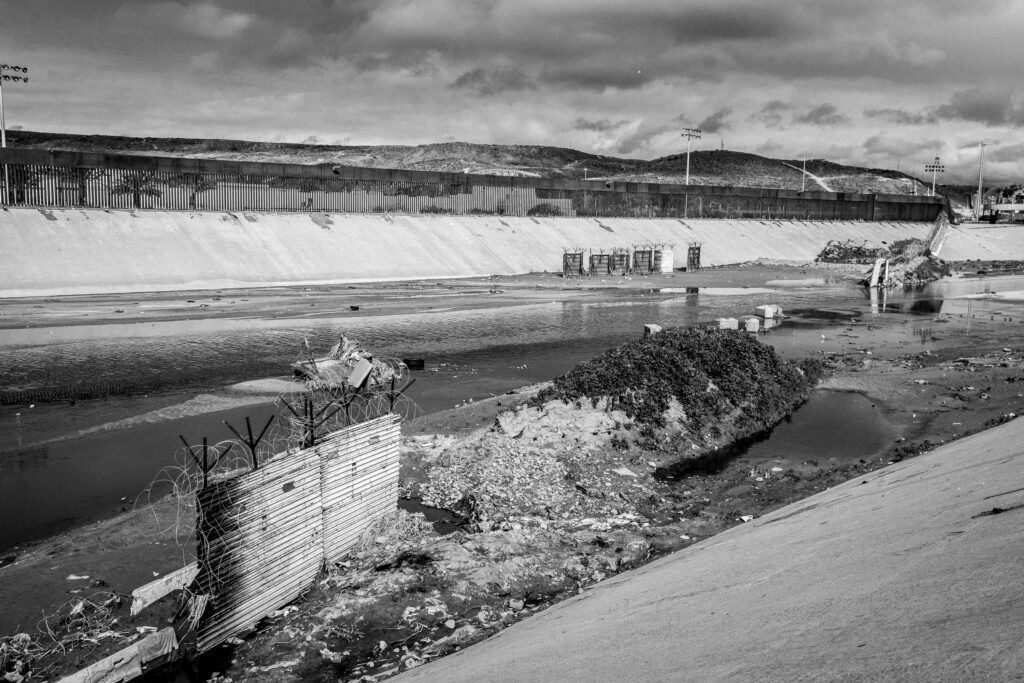 The remains of an earthen berm in the Tijuana River Channel. 