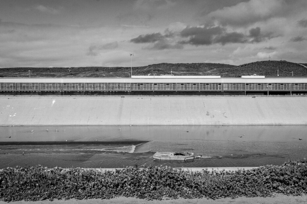 Tijuana river channel with the PedWest crossing along the opposite bank.