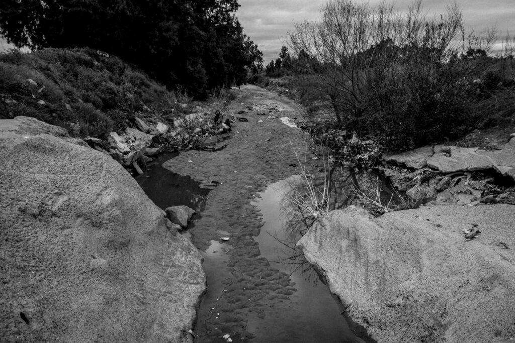 Trash lined Smuggler's Gultch.